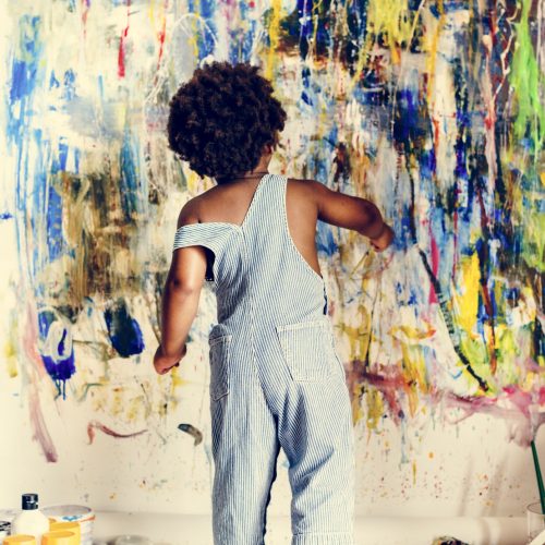 black-kid-enjoying-his-painting.jpg